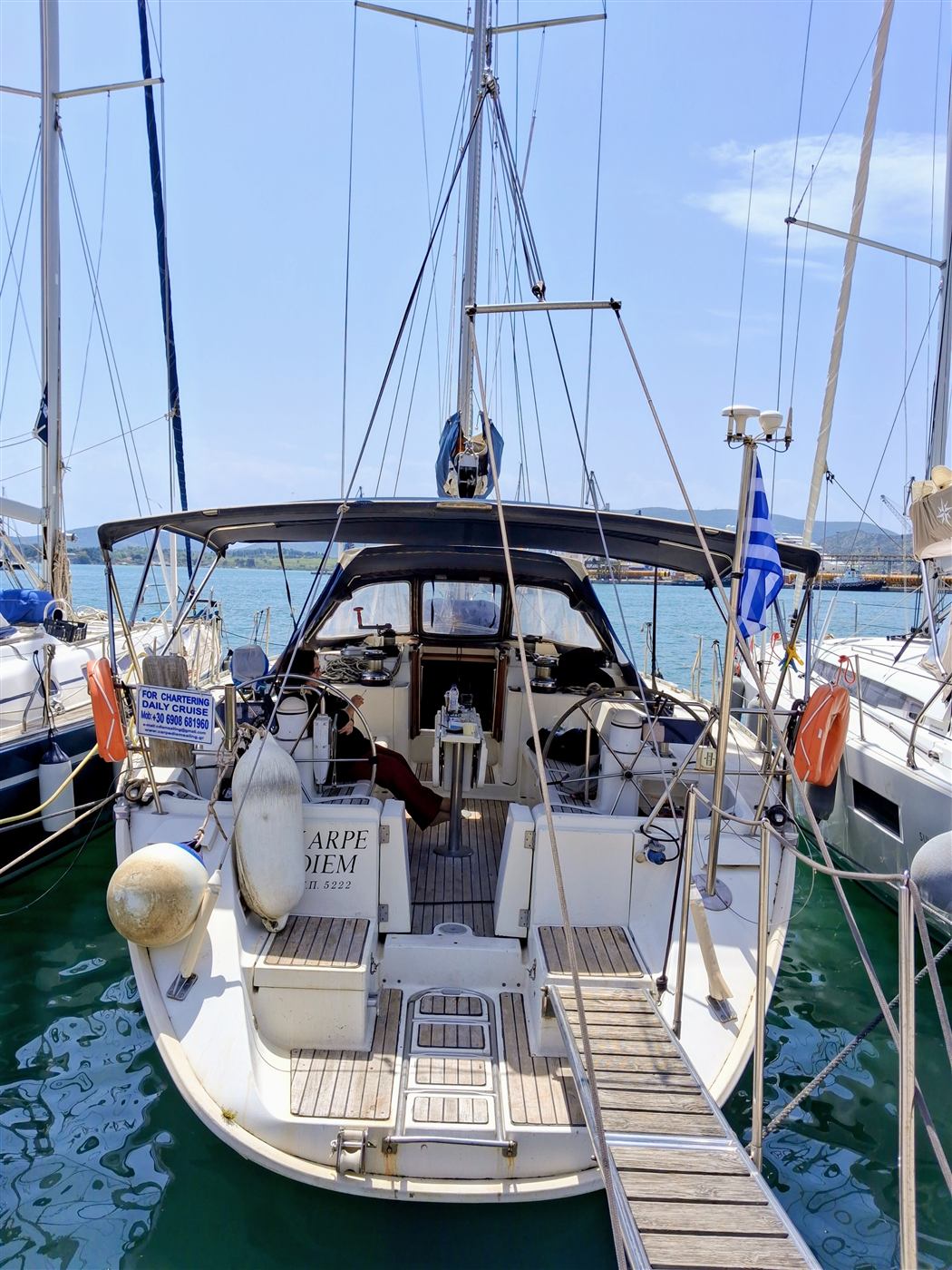 Carpe Diem moored stern-to at the floating pier with boarding gangway