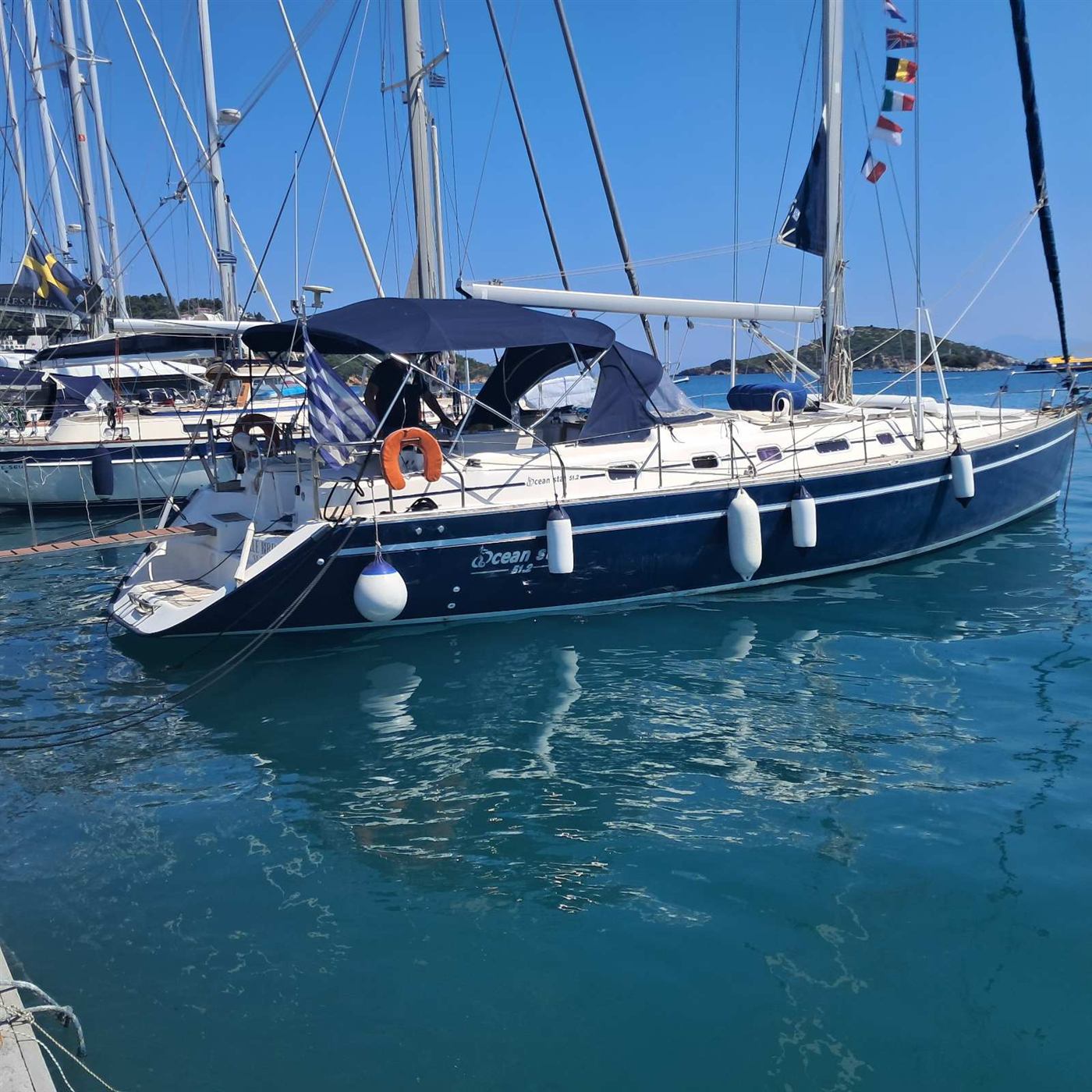 Blue Bird's dark blue hull at her mooring
