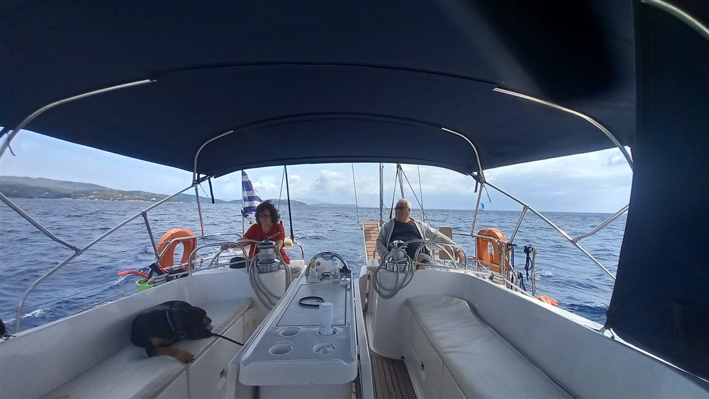 Guests relaxing in the shaded cockpit while under way